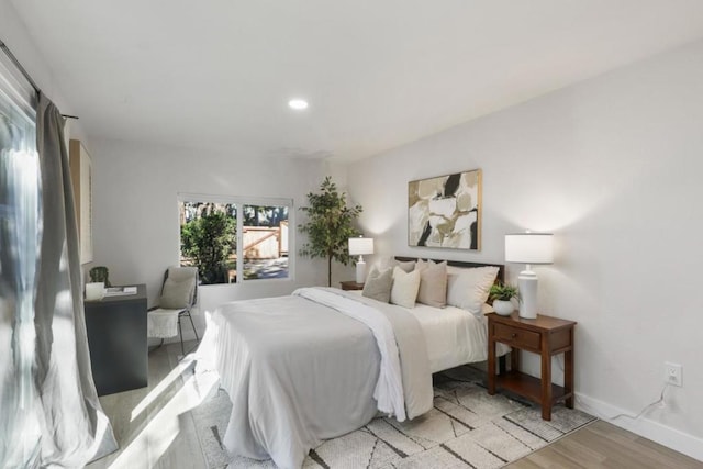 bedroom featuring light wood-type flooring