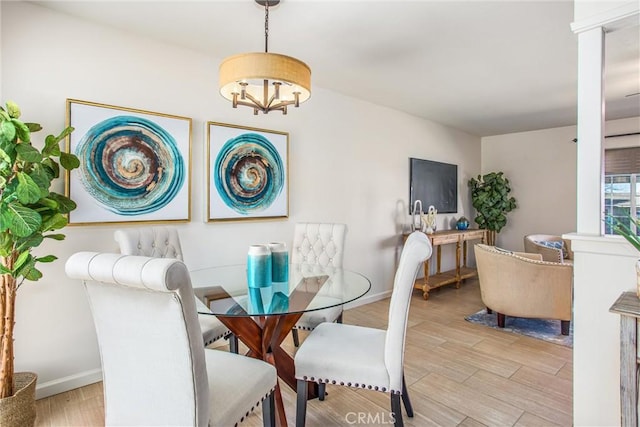 dining room with light hardwood / wood-style flooring