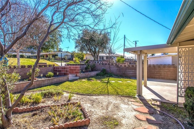 view of yard with a patio area