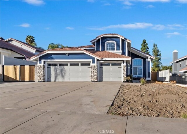 front of property with a garage