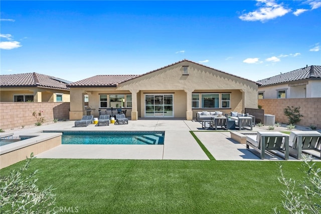 view of pool with an outdoor hangout area, a patio area, and a yard