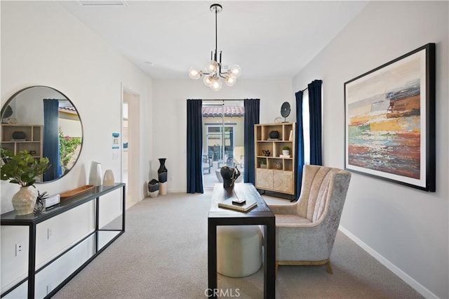 sitting room with light colored carpet and a notable chandelier