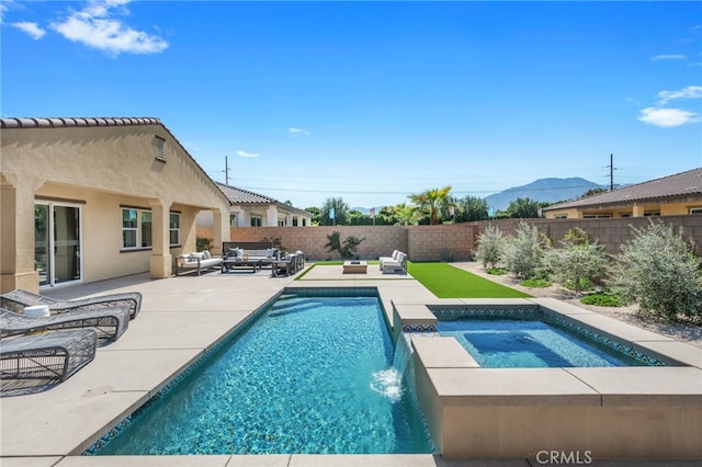 view of swimming pool with an outdoor hangout area, pool water feature, a patio area, and an in ground hot tub