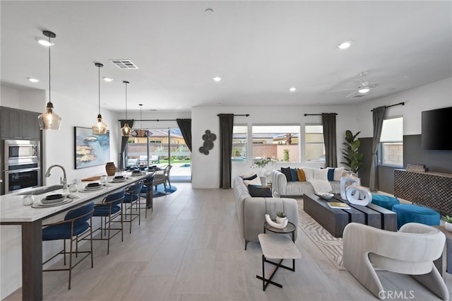 living room featuring ceiling fan