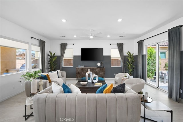 living room featuring ceiling fan