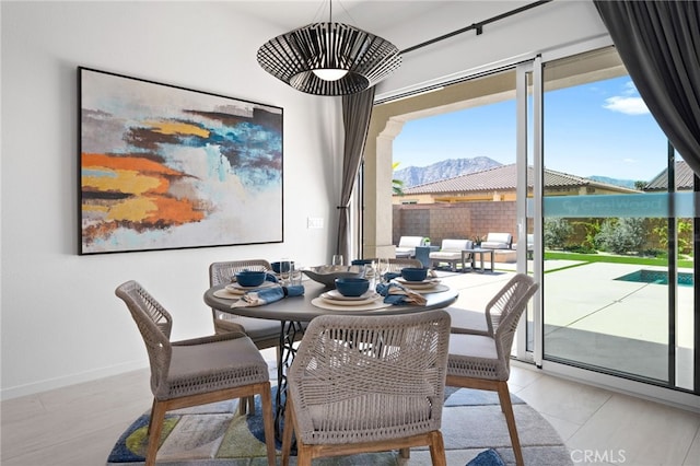 dining room with a mountain view