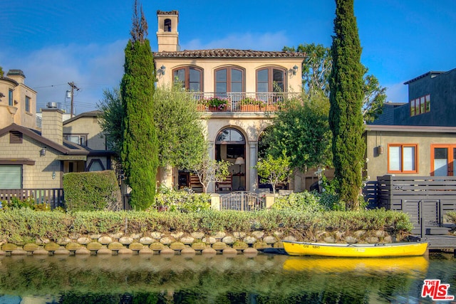 view of front facade featuring a water view