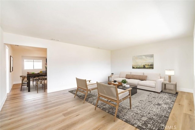 living room featuring light wood-type flooring