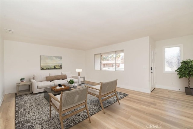 living room with light wood-type flooring