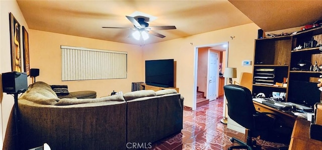 cinema featuring ceiling fan and tile patterned flooring