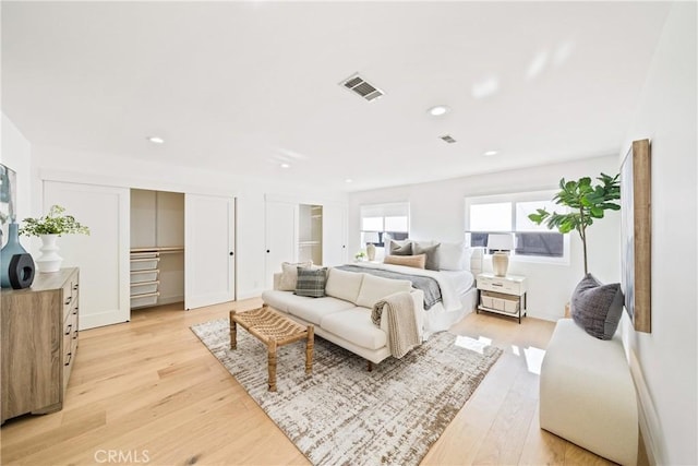 bedroom with light hardwood / wood-style flooring