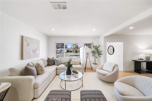 living room with light hardwood / wood-style flooring