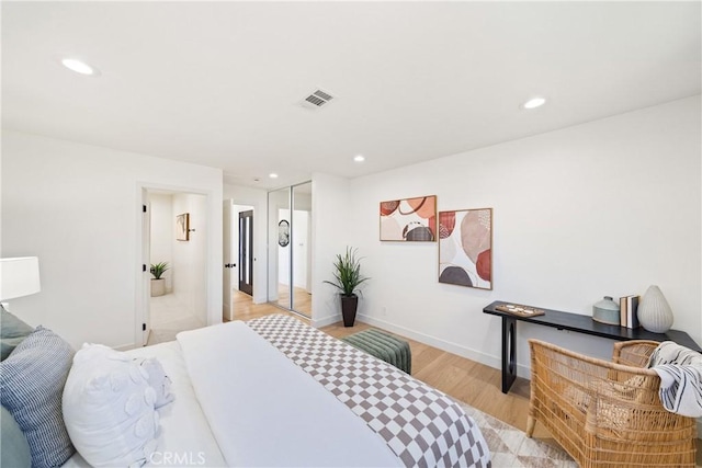 bedroom featuring light hardwood / wood-style flooring