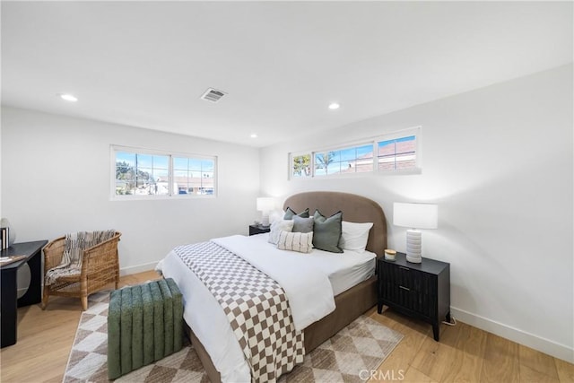 bedroom featuring light hardwood / wood-style floors