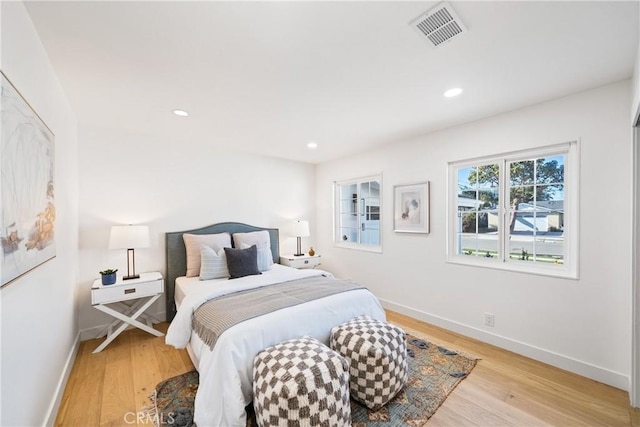 bedroom featuring light wood-type flooring