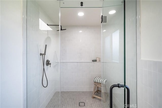 bathroom featuring an enclosed shower