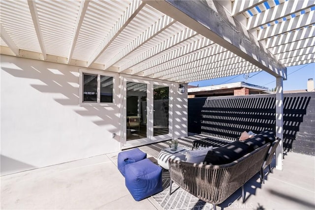 view of patio with french doors and a pergola