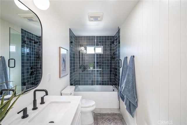 full bathroom featuring toilet, vanity, and combined bath / shower with glass door