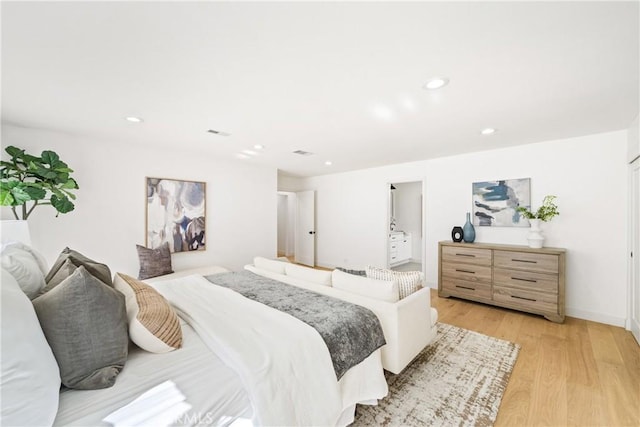 bedroom featuring light wood-type flooring