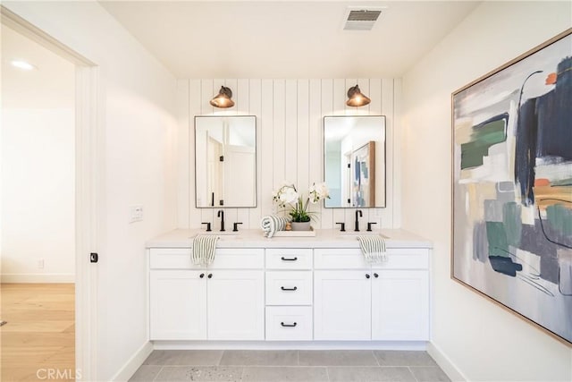 bathroom featuring vanity and tile patterned flooring