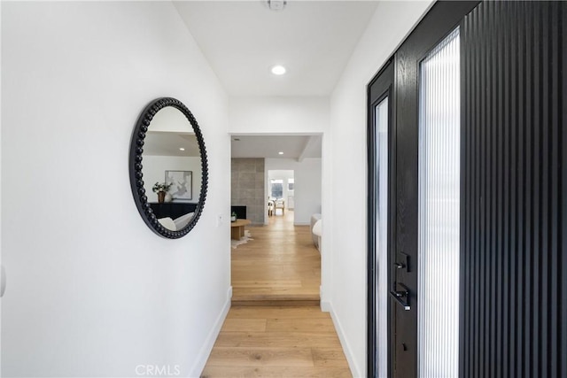 hall featuring light wood-type flooring