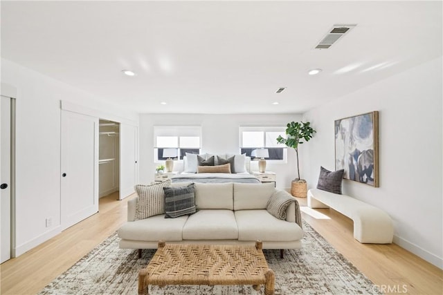 bedroom with light hardwood / wood-style floors