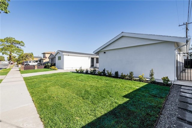 view of front of property with a front lawn