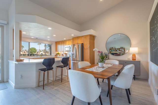 dining area featuring light hardwood / wood-style flooring