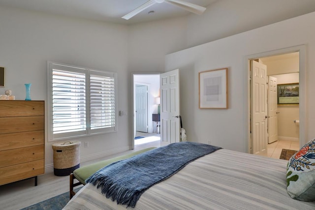 bedroom with ceiling fan and ensuite bathroom