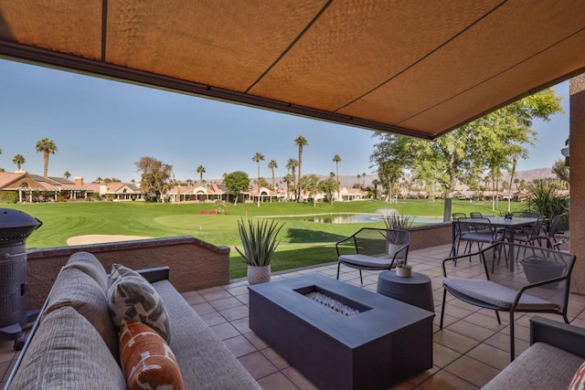 view of patio featuring a fire pit and area for grilling