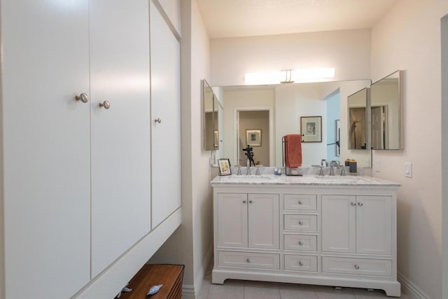 bathroom with vanity and tile patterned floors