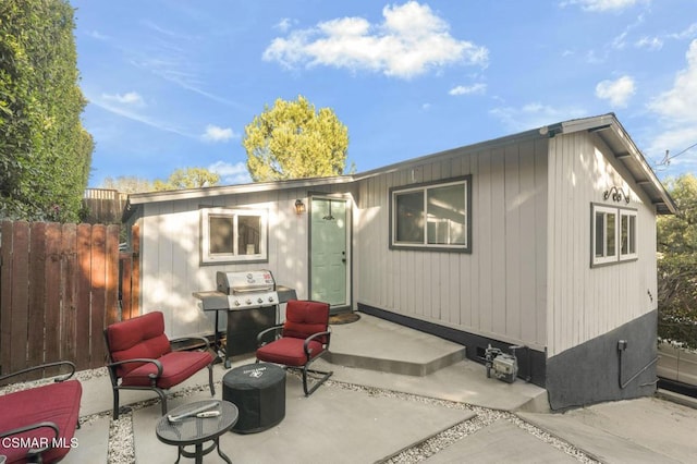 rear view of house with a patio area