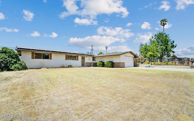 ranch-style house with a garage