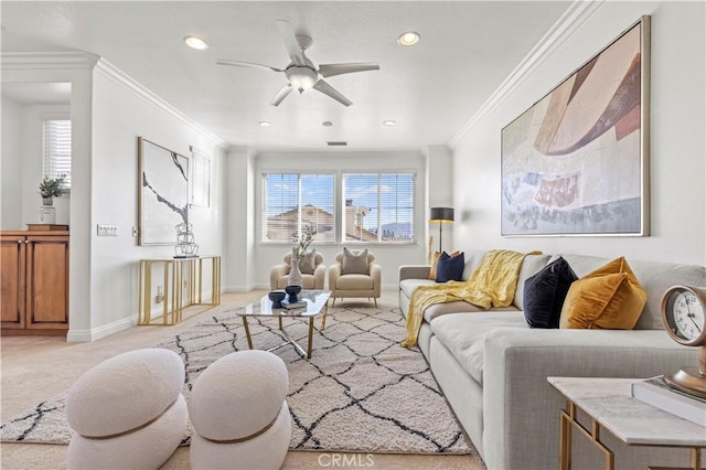 carpeted living room featuring ceiling fan and crown molding