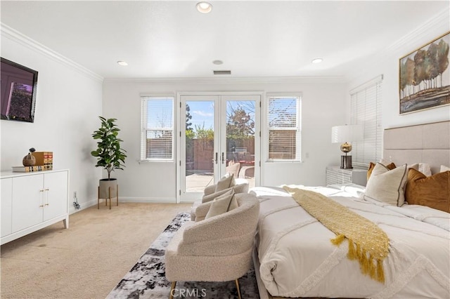 bedroom with light carpet, french doors, access to outside, and multiple windows