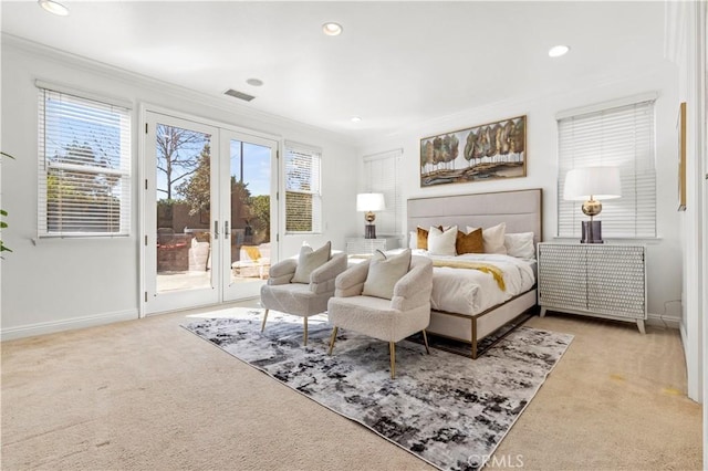 bedroom with crown molding, light colored carpet, access to outside, and multiple windows