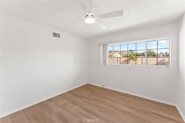 unfurnished room with light hardwood / wood-style floors and ceiling fan