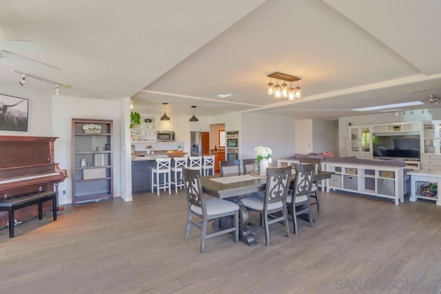 dining room featuring light wood-type flooring