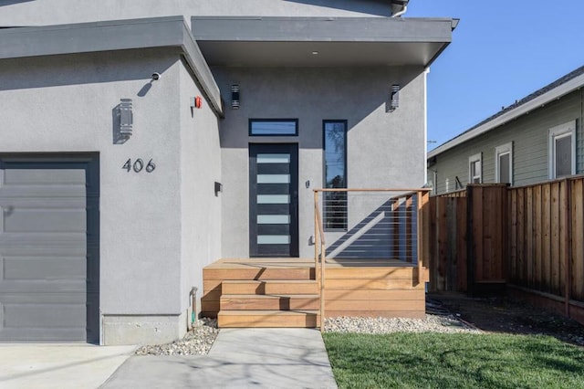 property entrance with a garage