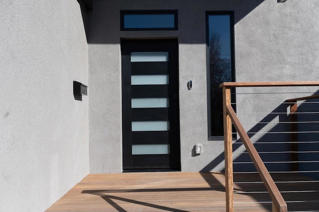 entrance to property with a balcony