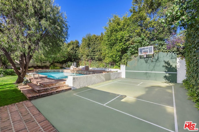 view of basketball court with tennis court