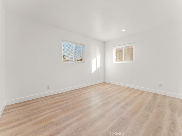 empty room featuring light hardwood / wood-style floors