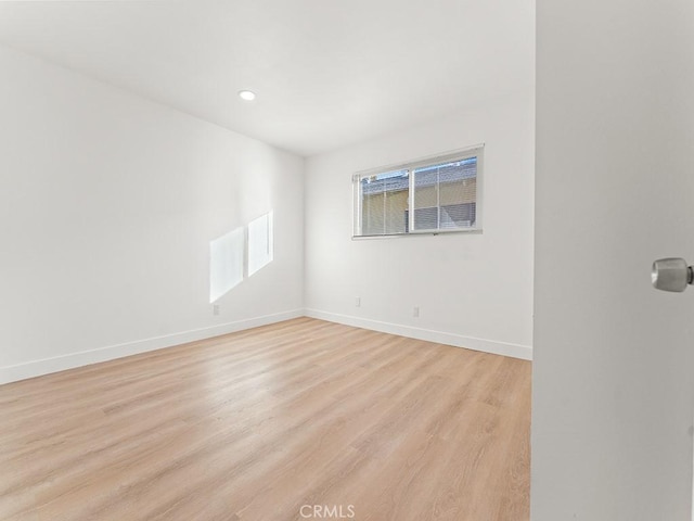 empty room featuring light hardwood / wood-style floors