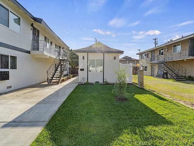 exterior space with a lawn