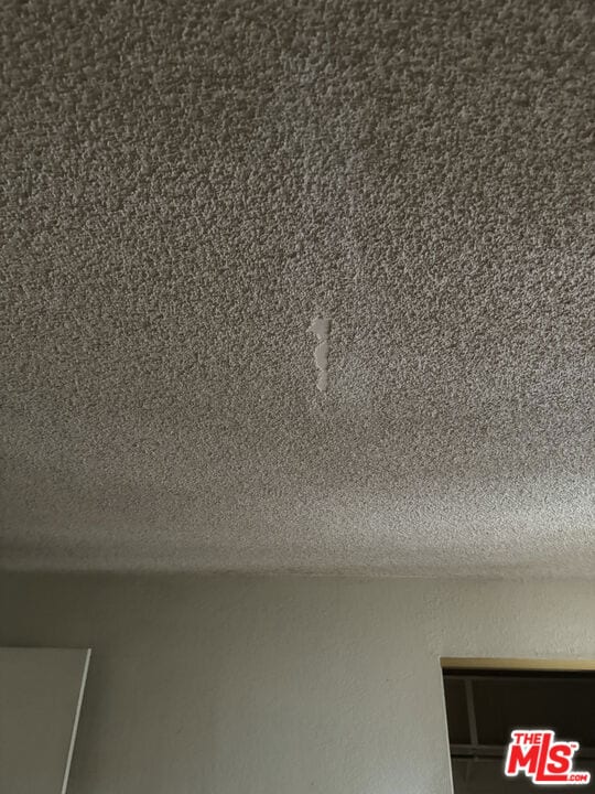 room details with a textured ceiling