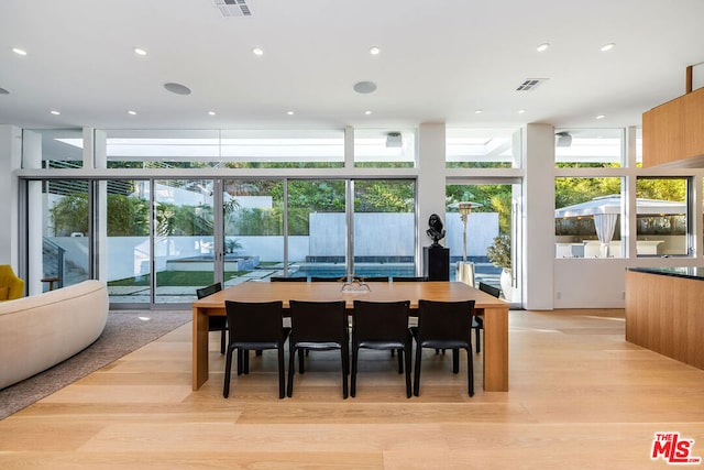 dining room with light wood-type flooring