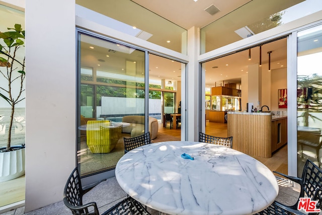 view of patio / terrace featuring a jacuzzi