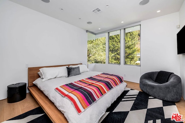 bedroom featuring light hardwood / wood-style flooring