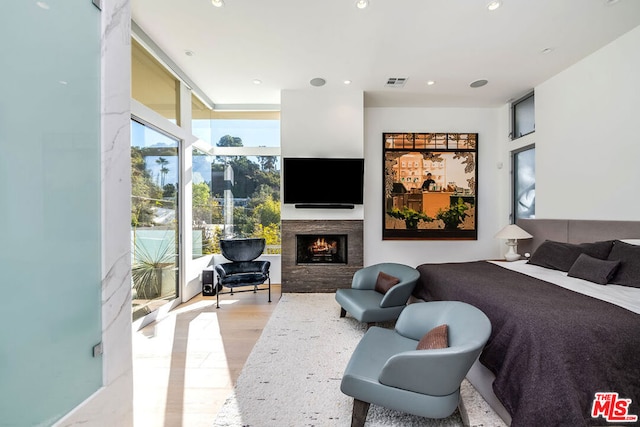 bedroom featuring light hardwood / wood-style floors