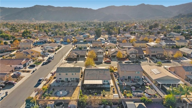 bird's eye view with a residential view and a mountain view